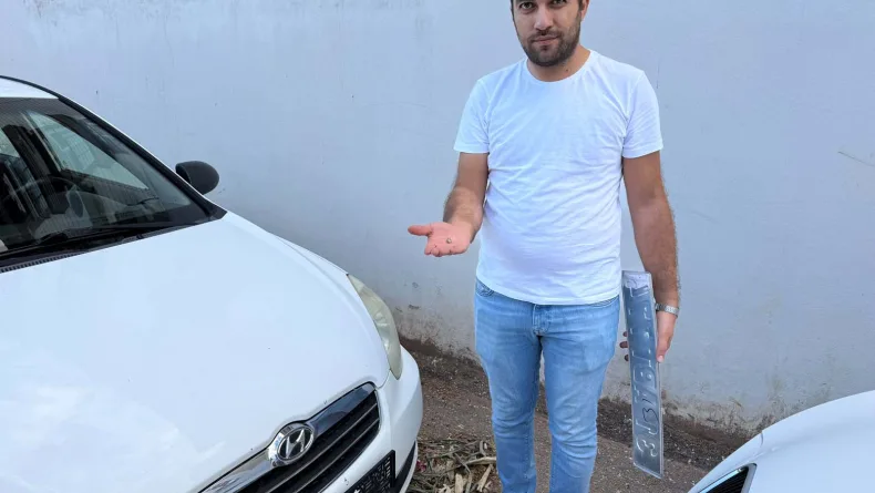 Temizlik yaparken otomobiline yorgun mermi isabet etti